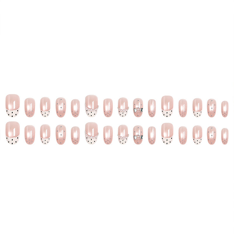 Artificial nail set with elegant French design and delicate pearl embellishments Stornfield