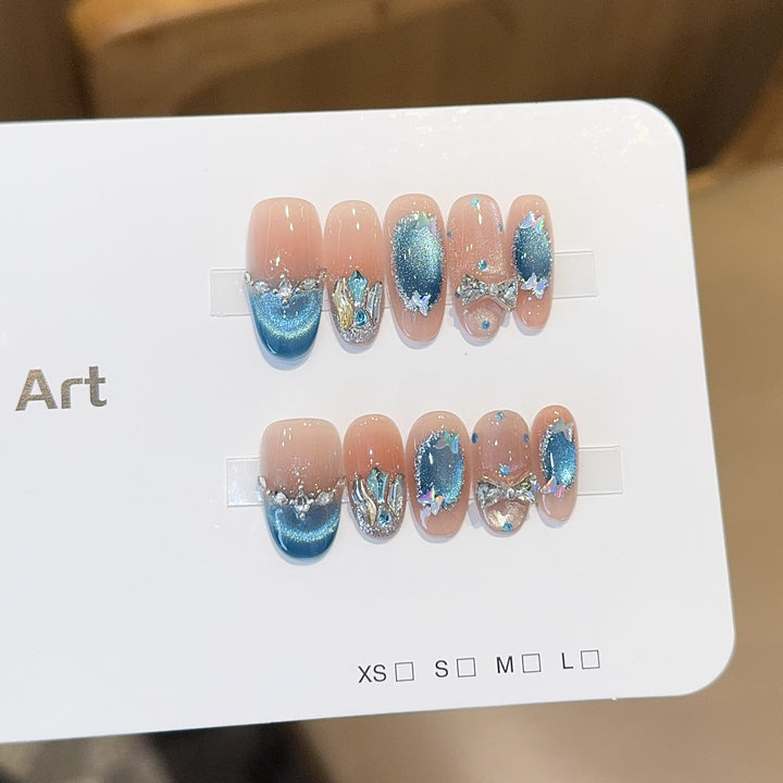 Artificial nail tips with glitter and watercolor effect Stornfield