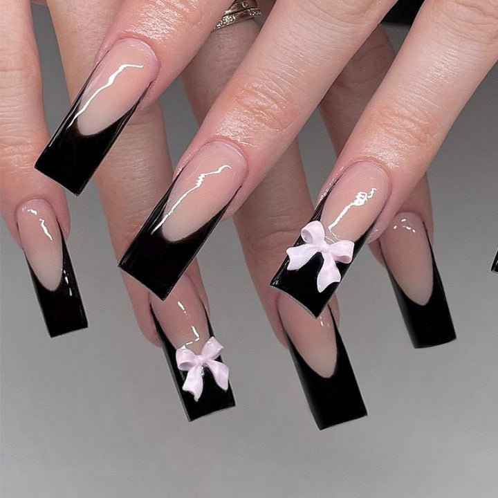 Artful Nail Extensions with Bow Design Stornfield