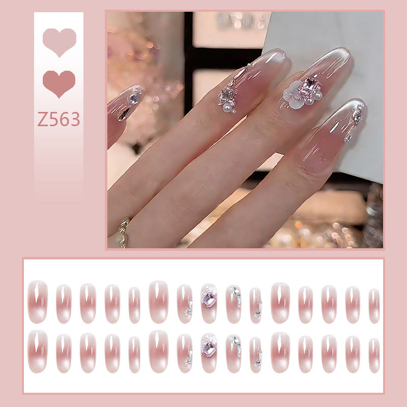 Nail art set with glamorous 3D applications and elegant floral decorations Stornfield