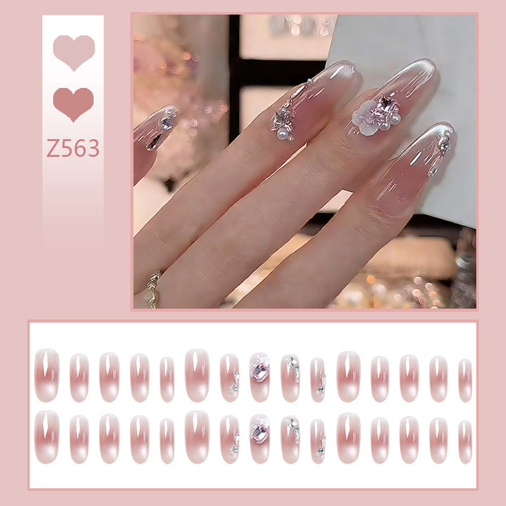 Nail art set with glamorous 3D applications and elegant floral decorations Stornfield