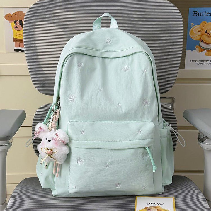 Playful backpack with fine embroidery Stornfield