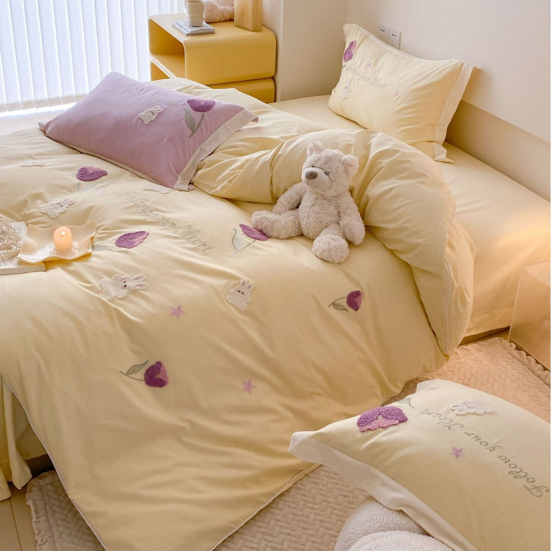 Romantic cotton satin bedding set with embroidered rabbit and flower appliqués