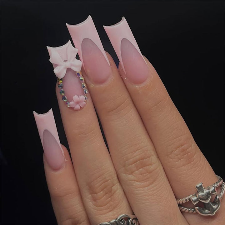 Decorative Press-On Nail Art with Floral and Bow Accents Stornfield