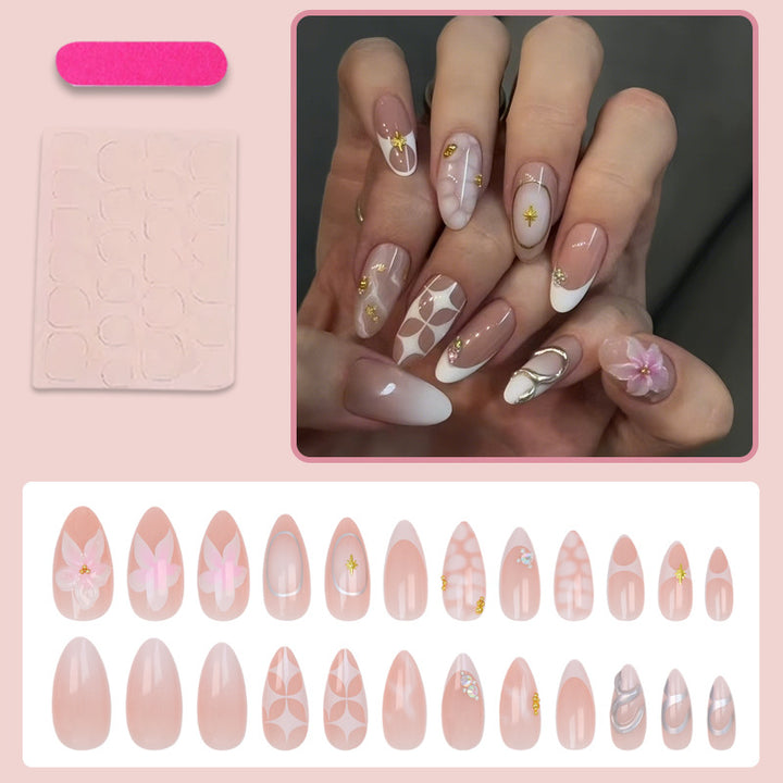 Acrylic nail set with romantic flowers and elegant design elements Stornfield