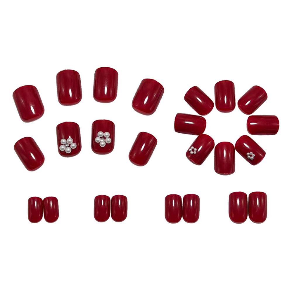 Artificial nails with glamorous decorations Stornfield