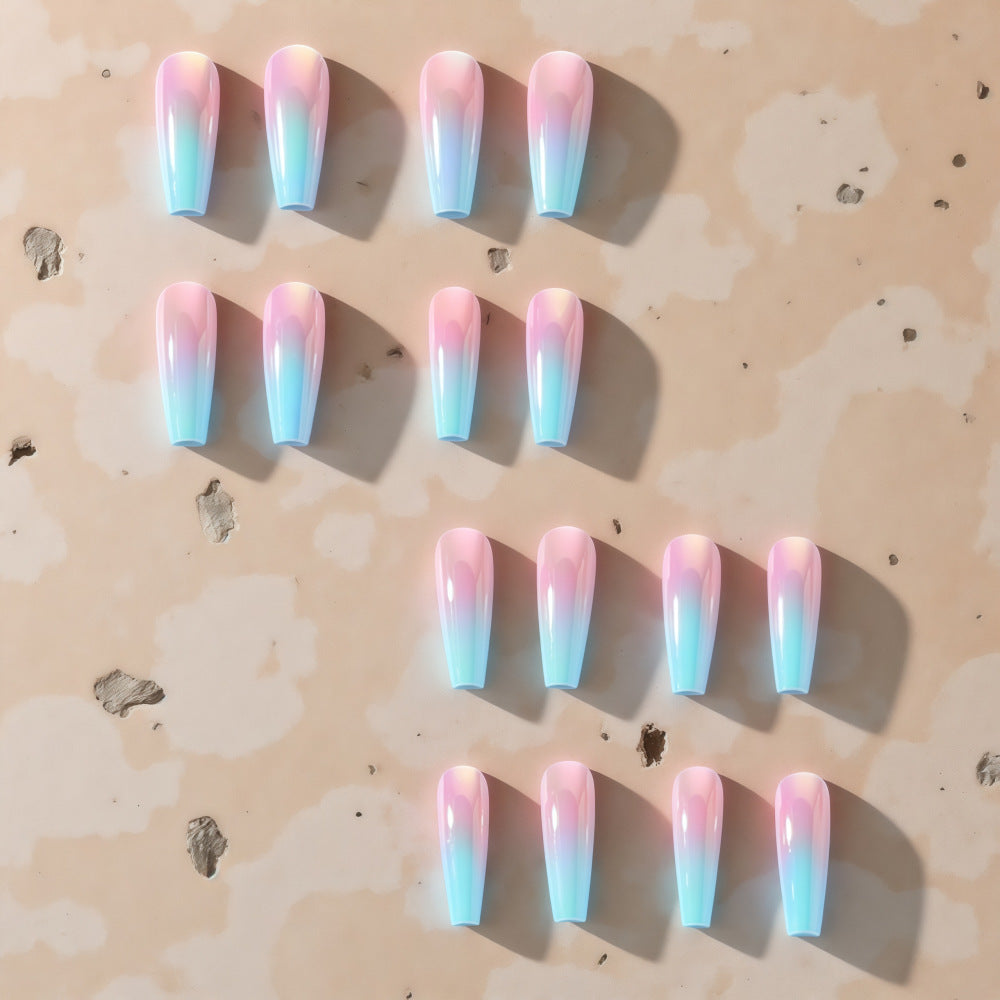 Artificial nails in modern glitter gradient design Stornfield