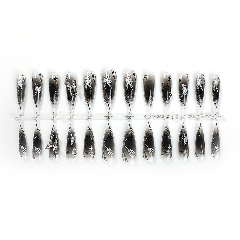 Artificial nail set with elegant floral design and sparkling accents Stornfield
