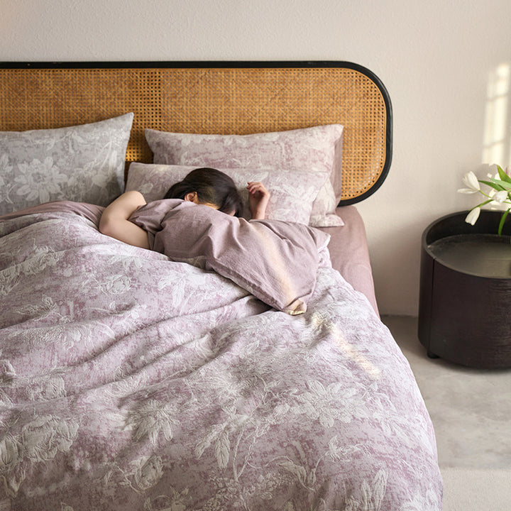 Reversible cotton bedding set with floral toile print and linen look