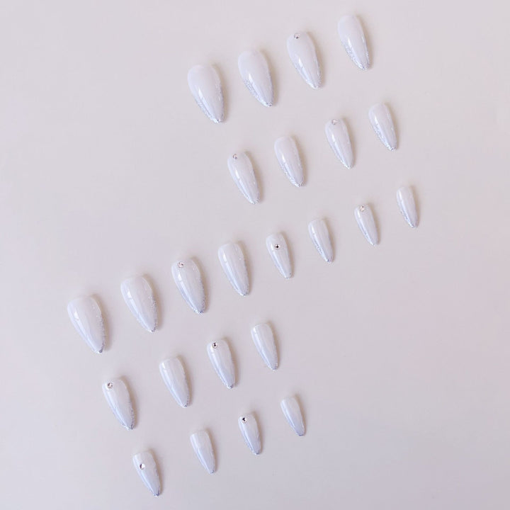 Acrylic nail set with elegant tips and sparkling accents Stornfield