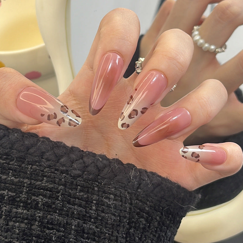 Artistic Stiletto Press-On Nail Design with Leopard Accents Stornfield