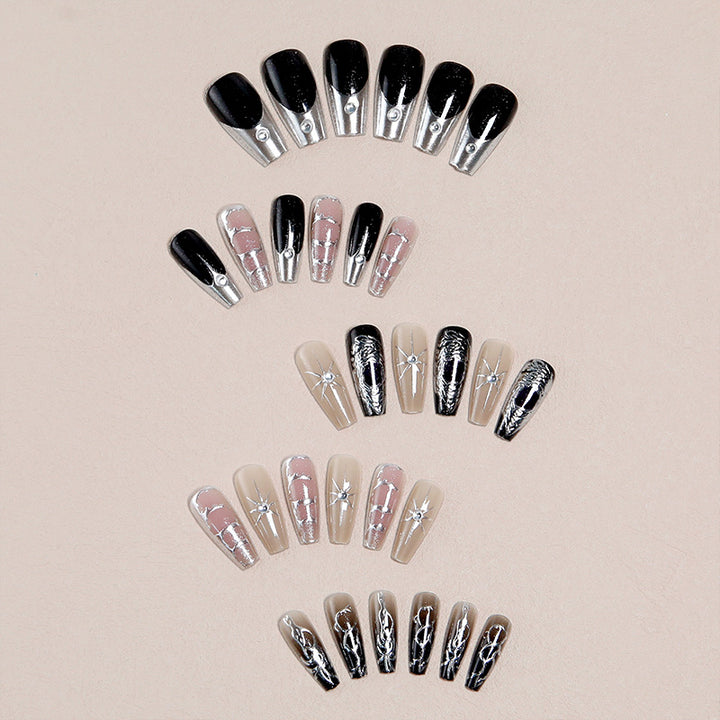 Artful nail tips with elegant patterns Stornfield