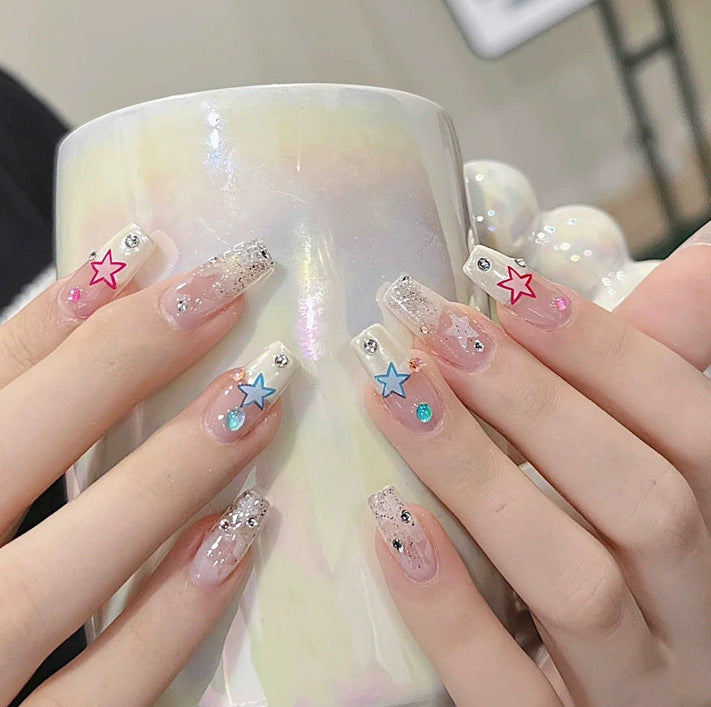 Elegant nail design with pearl embellishment Stornfield