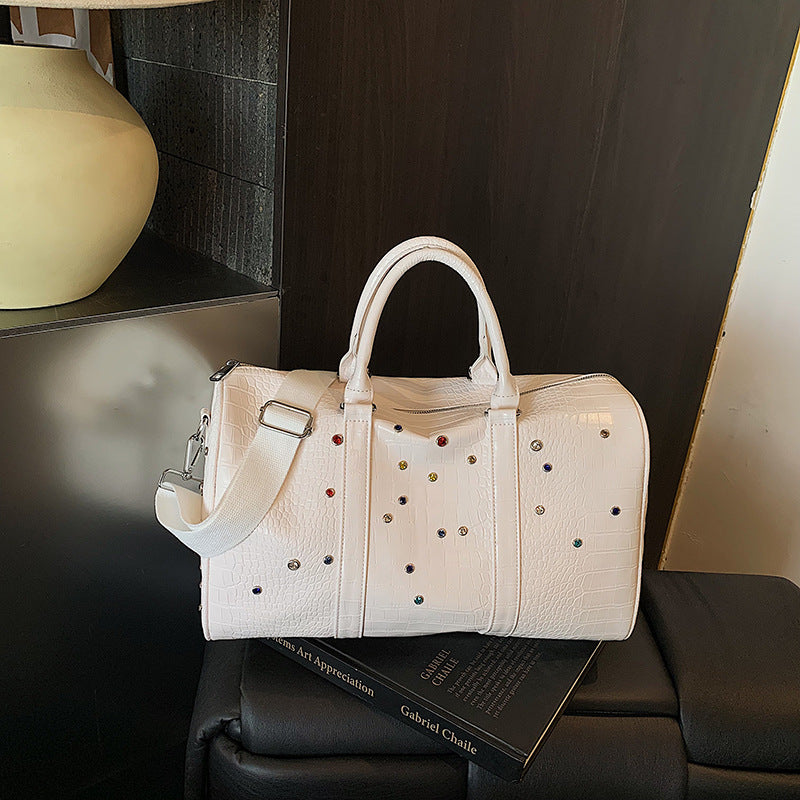 Fashionable travel bag with structured surface and versatile interior Stornfield