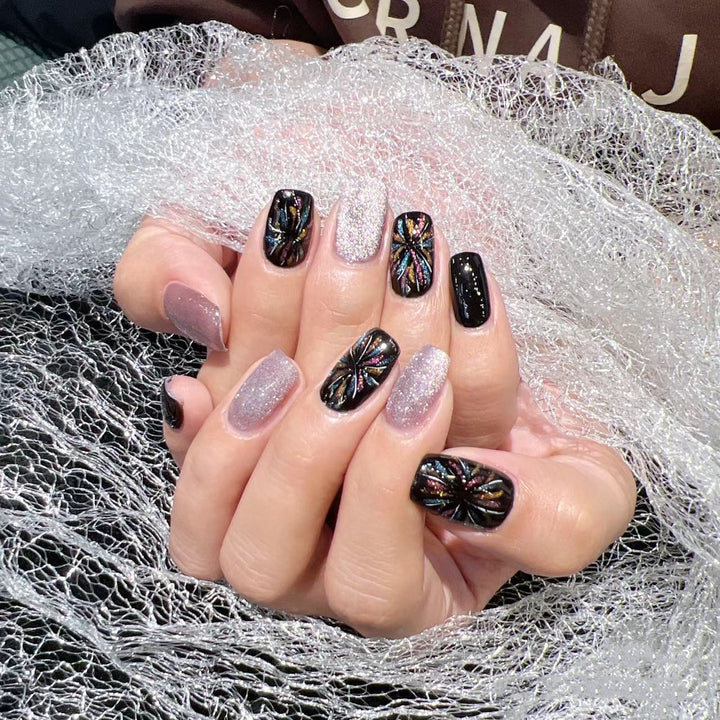 Artificial nails with glitter and floral patterns Stornfield
