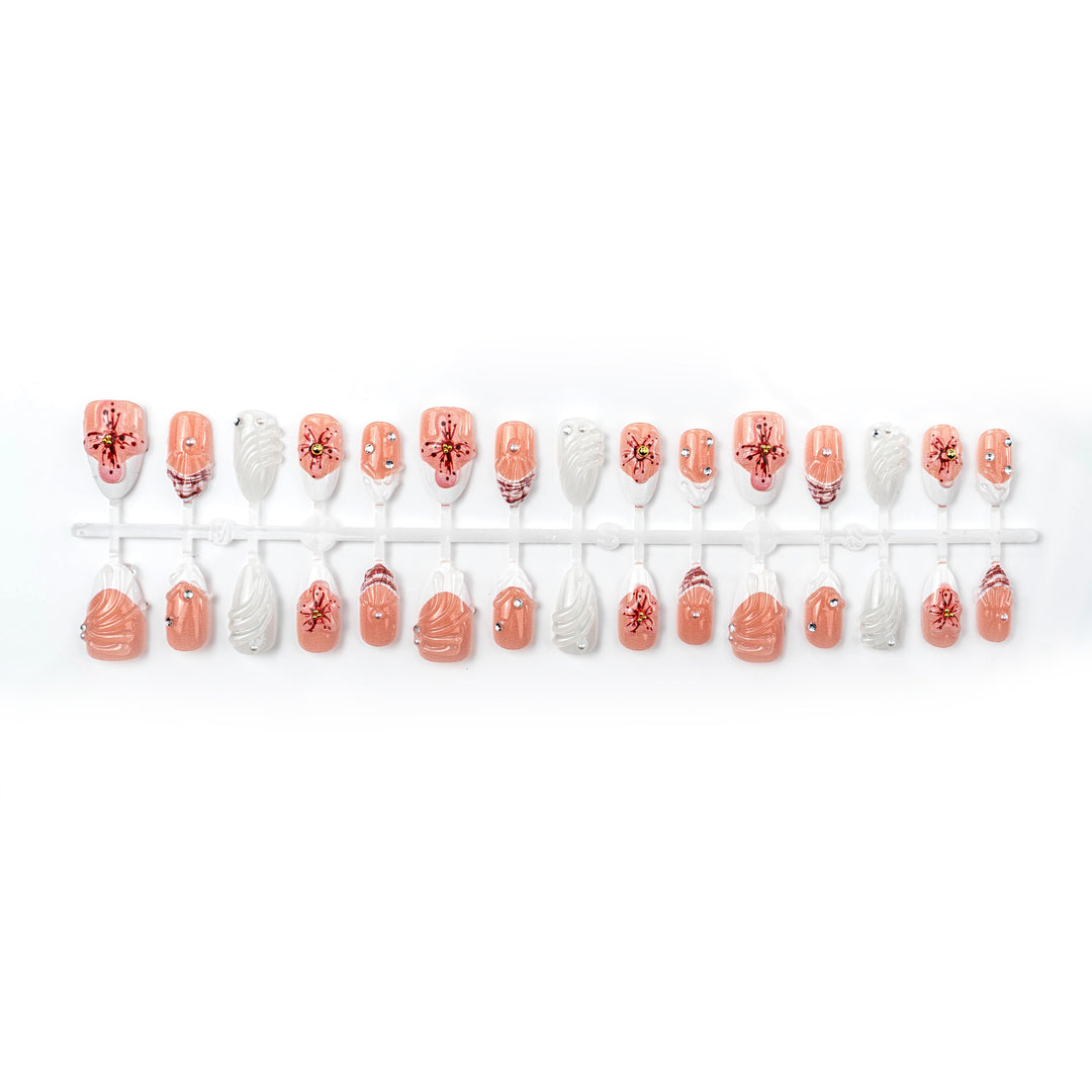 Artificial nails with handcrafted flower and glitter elements Stornfield