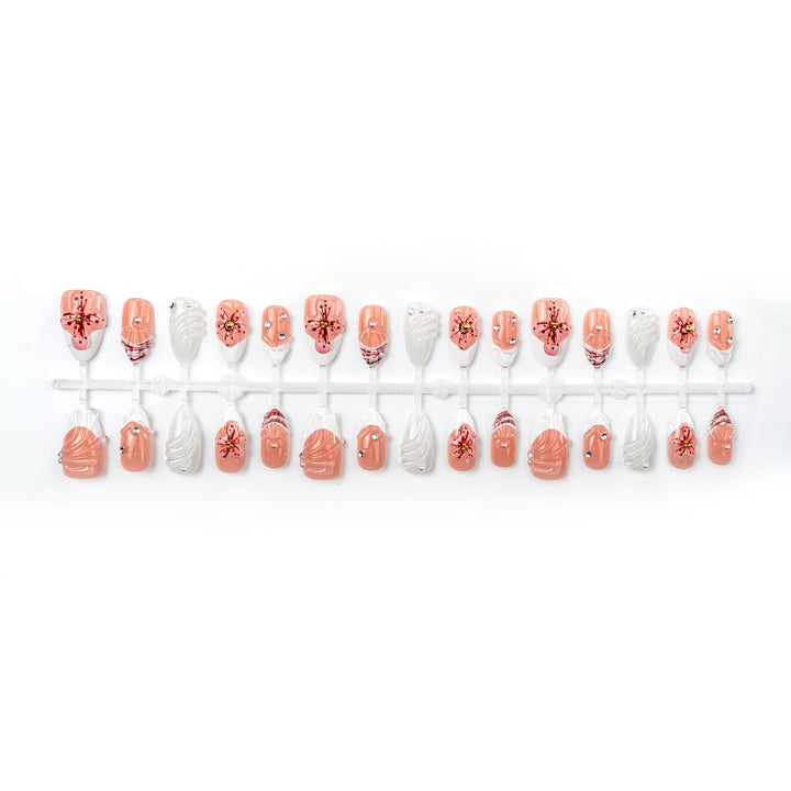 Artificial nails with handcrafted flower and glitter elements Stornfield