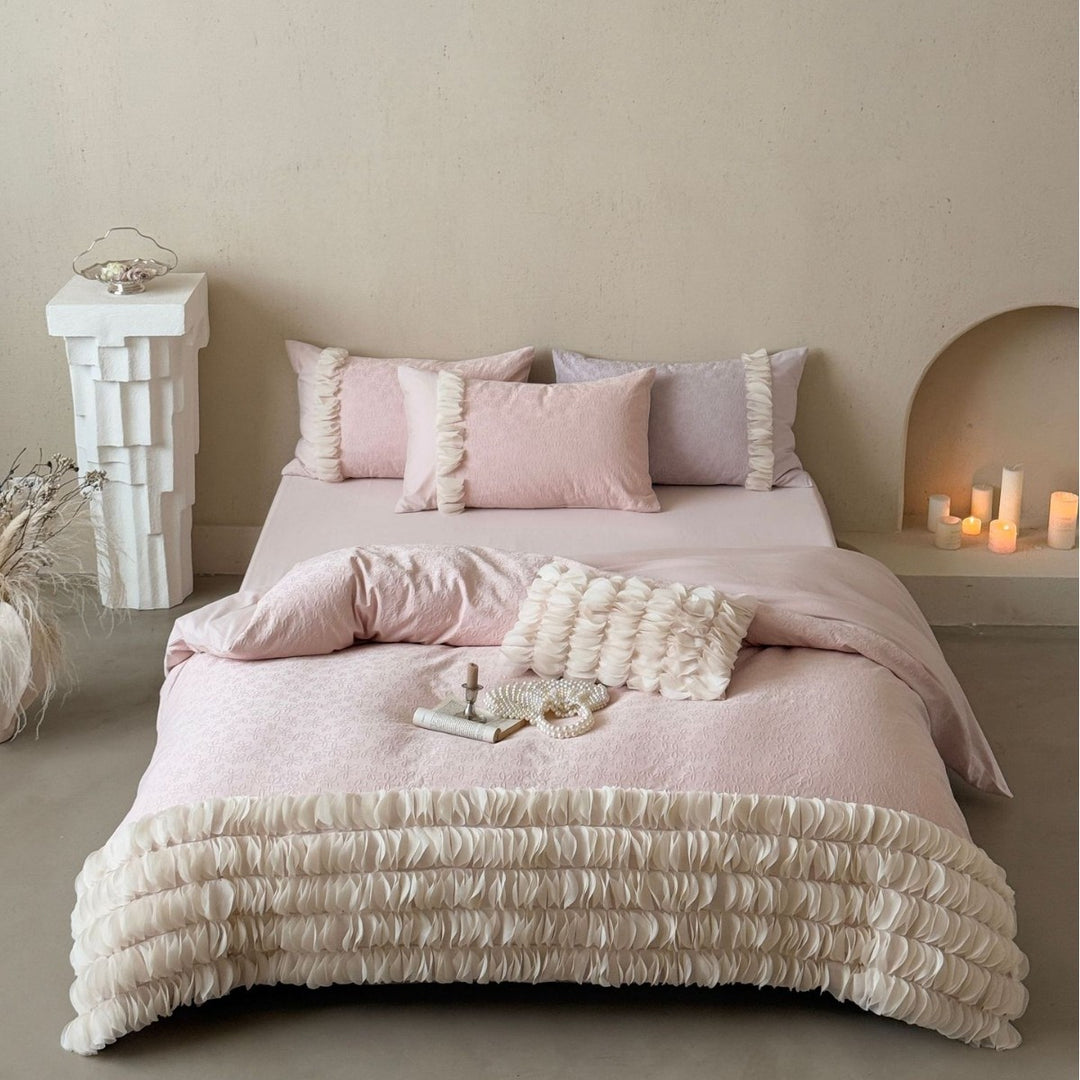 Romantic ruffle bedding set with layered frill and quilted bedspread