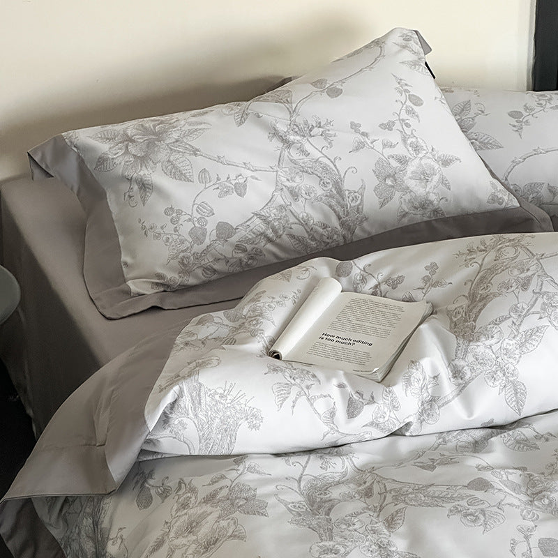Exclusive cotton satin bed linen set with floral jacquard structure and reversible function