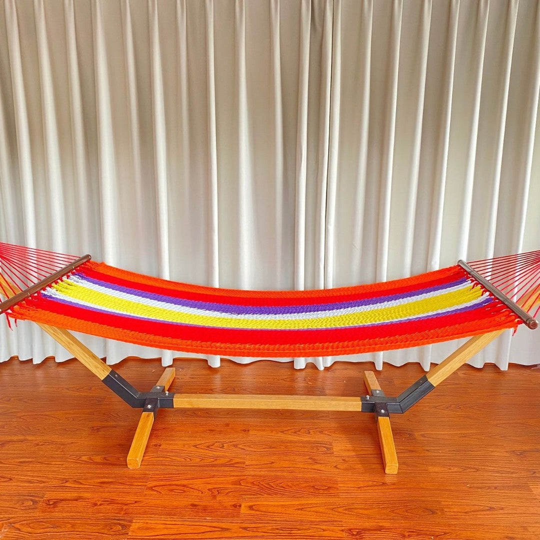 Woven cotton hammock with wooden spreader bars and freestanding stand Stornfield