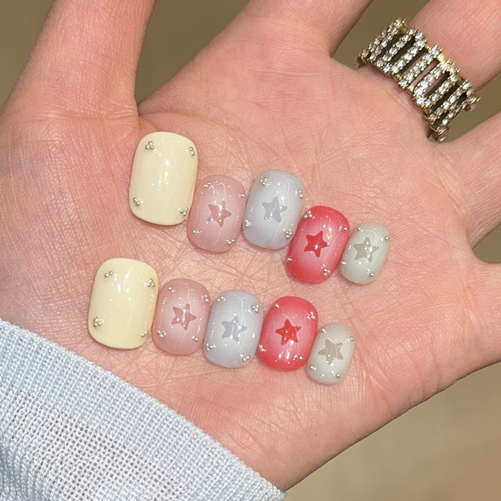 Artificial nails with sparkling star motifs Stornfield
