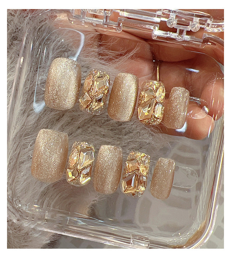 Artifical nail tips with glitter and rhinestones Stornfield