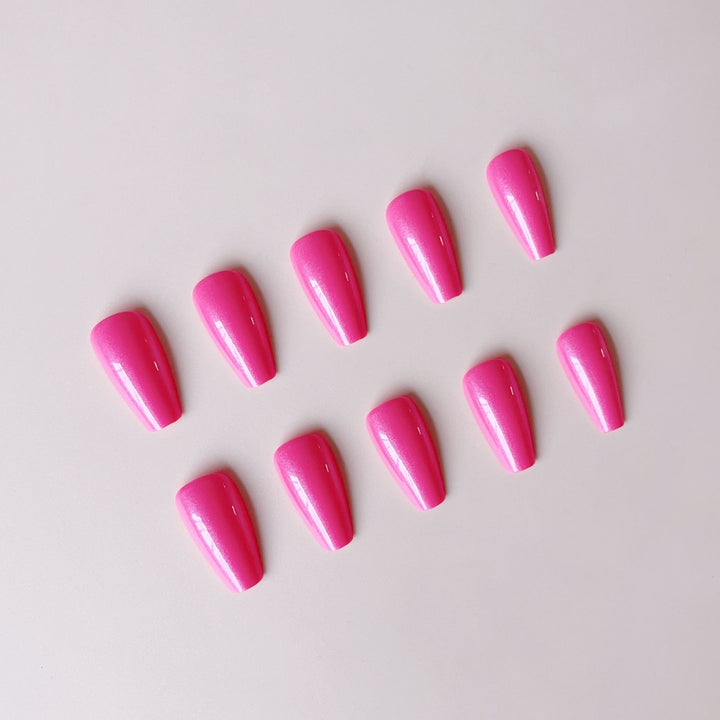 Artificial nail set with glossy finish and stylish elongated tips Stornfield