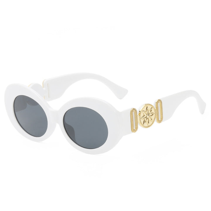 Ladies fashionable sunglasses with striking golden accents Stornfield