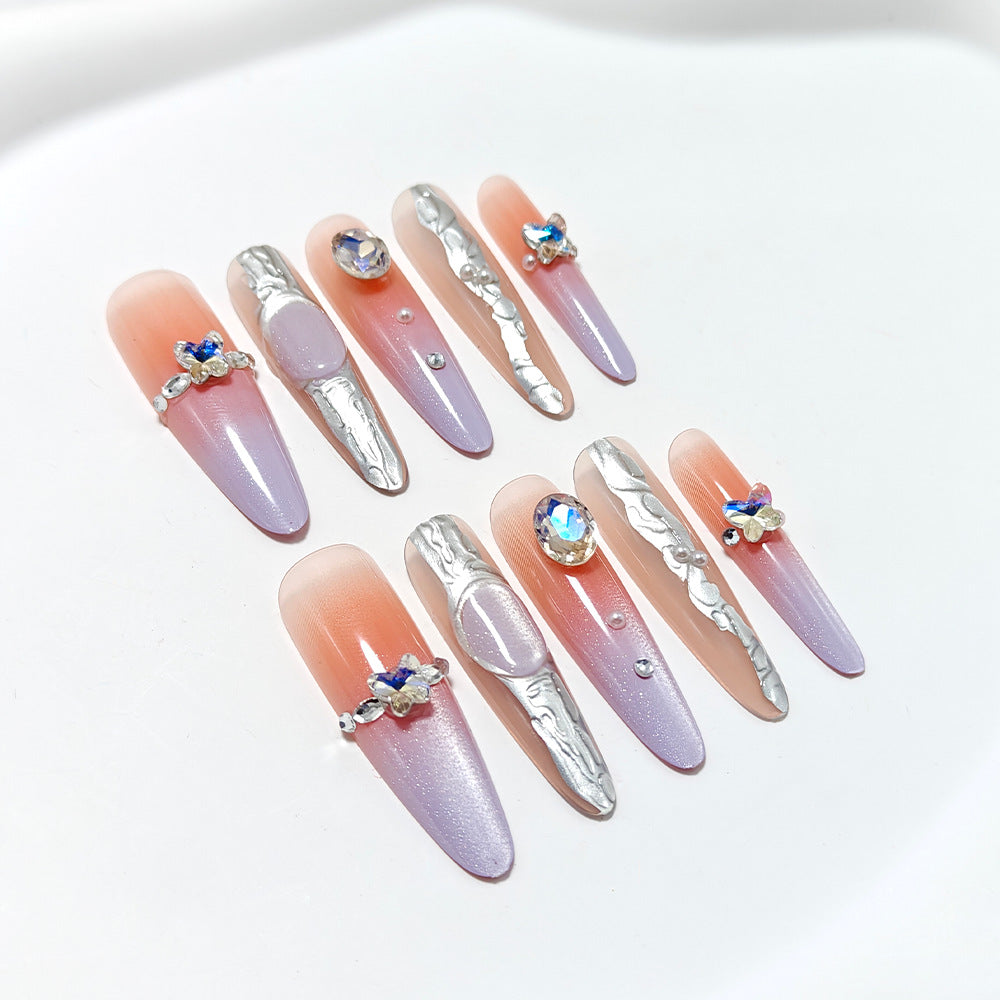 Artificial nails with elegant ombre design and jewelry accents Stornfield