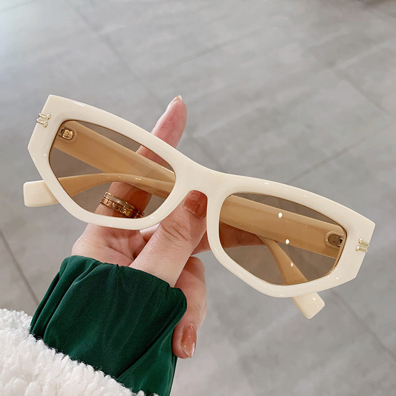 Ladies geometric sunglasses with curved frame and protective UV filter Stornfield
