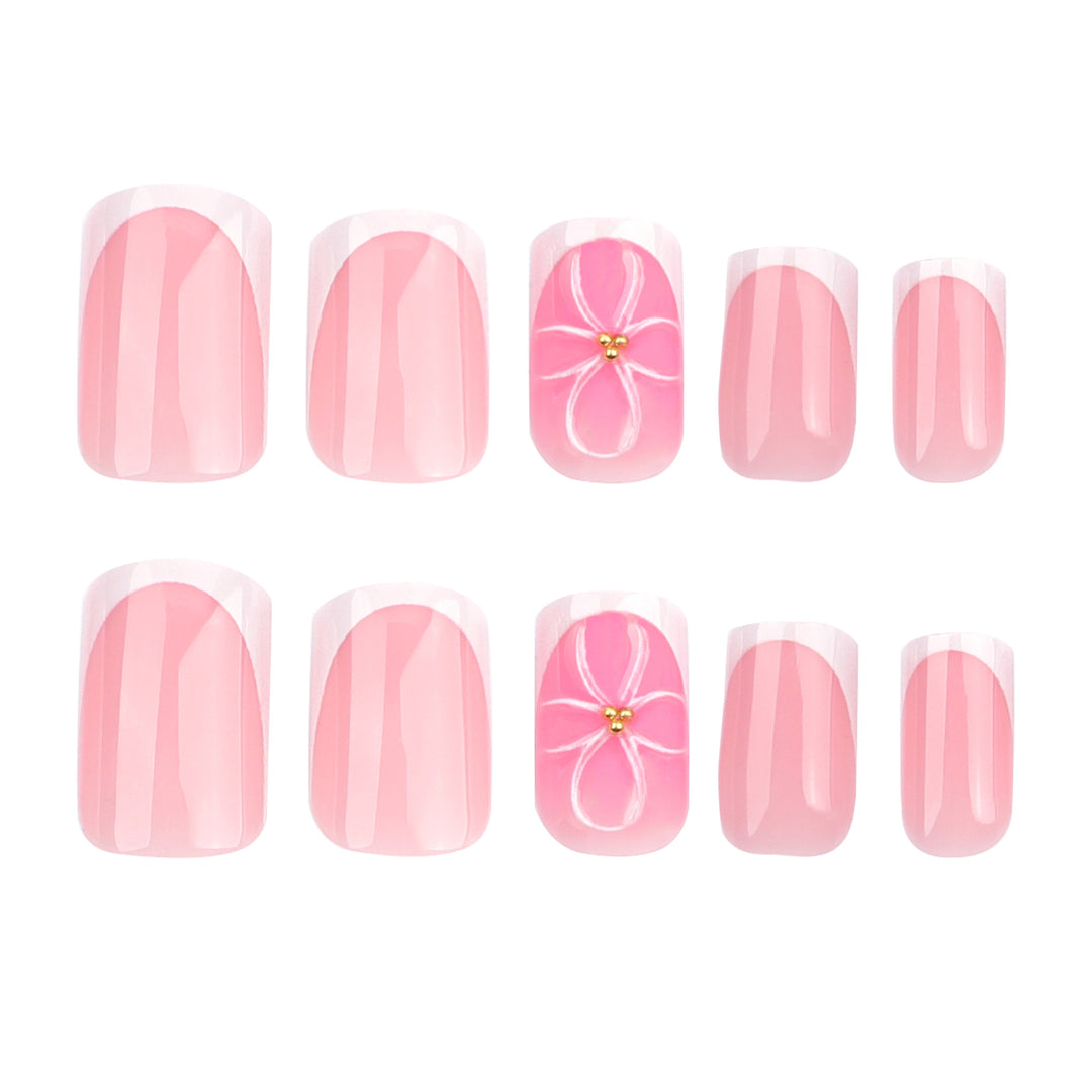 Artistic nail art with delicate flowers and elegant French lace Stornfield