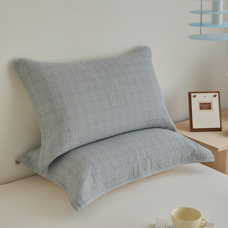 Textured cushion cover set made of cotton-linen blend with waffle structure