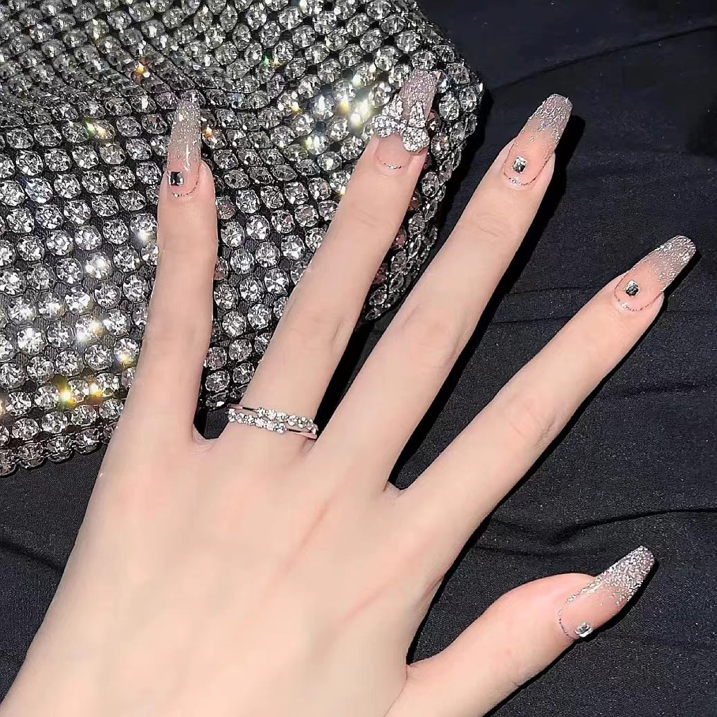 Glamorous artificial nails with sparkling elements