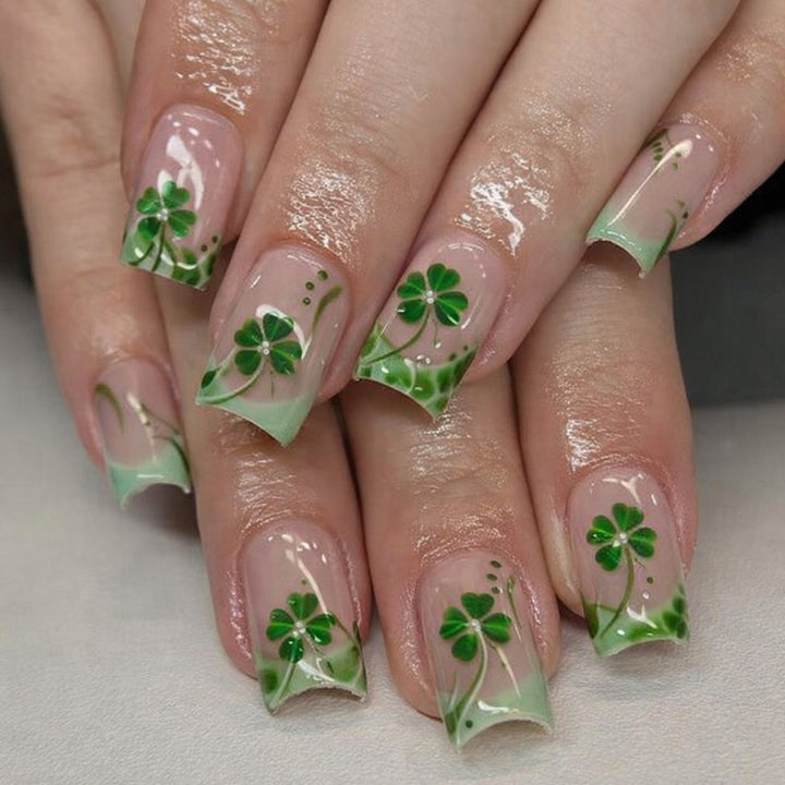 Artificial nail set with glamorous glitter and lucky designs Stornfield