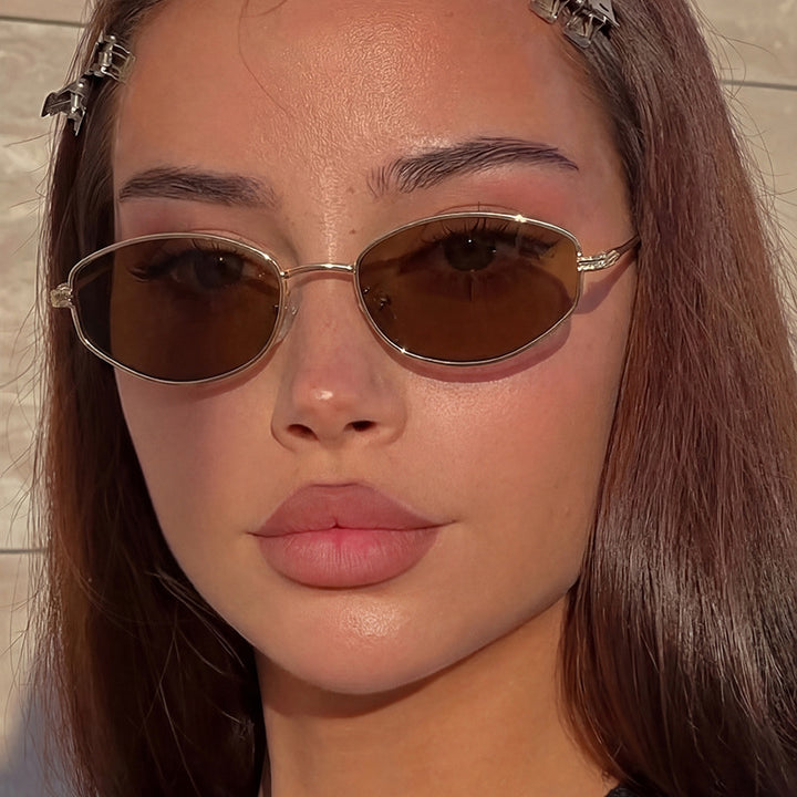 Ladies' fashionable sunglasses in minimalist oval design Stornfield