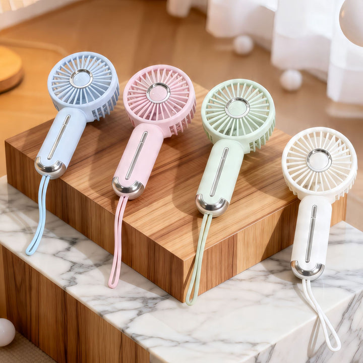 Women portable handheld fan with USB charging function and ergonomic design Stornfield