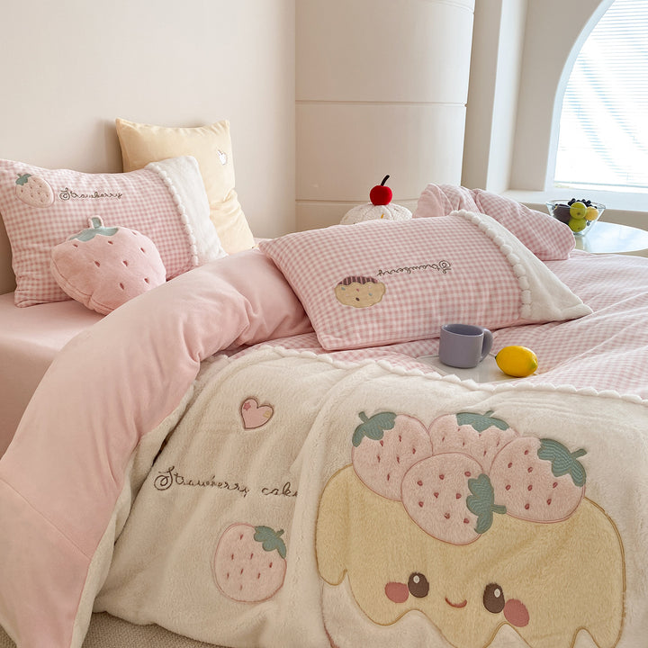 Children's bedding set with embroidered strawberry appliqué, cuddly reversible cover and Vichy check