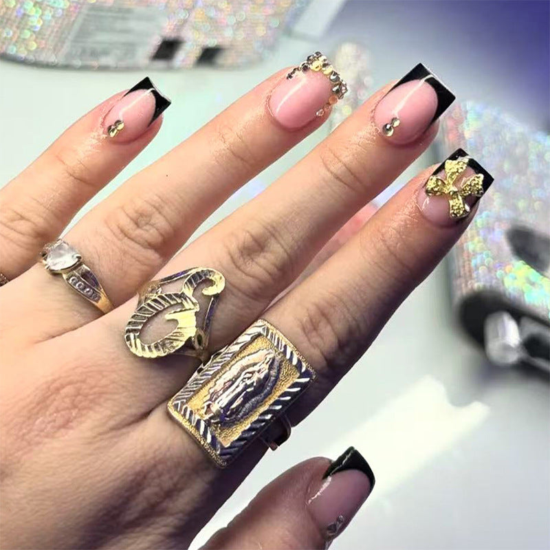 Artificial nail set with elegant black tips and sparkling accents Stornfield