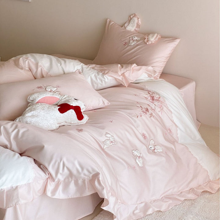 Bedding set with applied bunny embroidery, frill edge, and decorative pillow ears