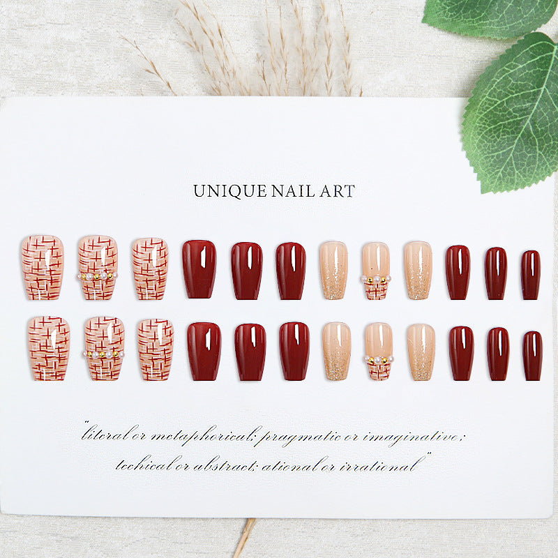 Artificial nail set with glamorous glitter and textural accents Stornfield