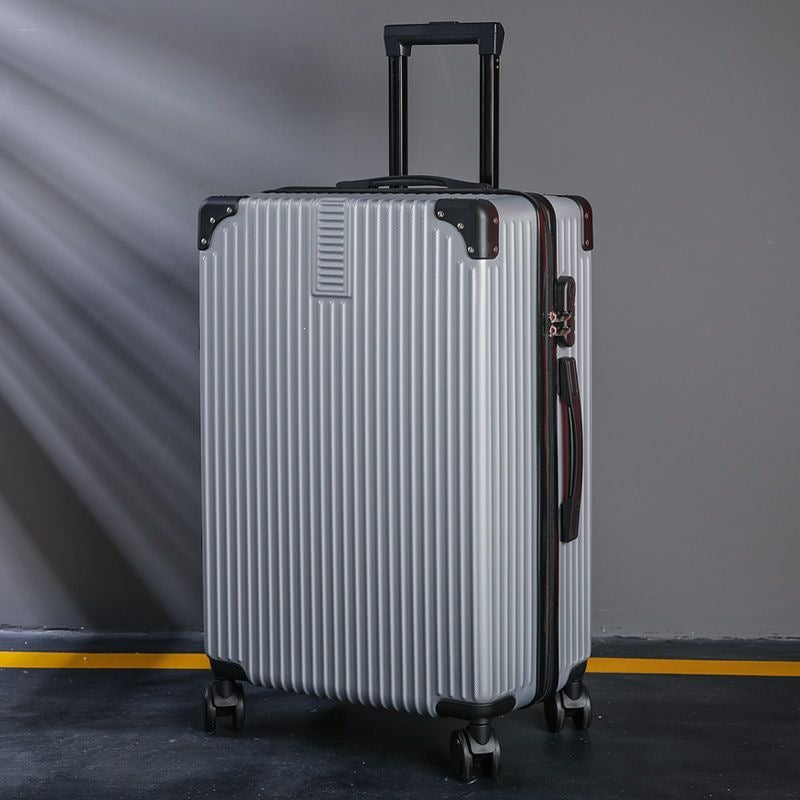 Hard shell suitcase with 360-degree wheel system and integrated safety feature Stornfield