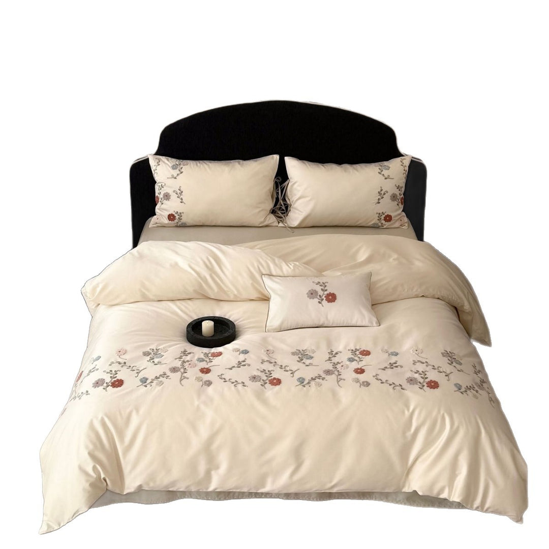 Luxurious satin bedding set with floral embroidery and pillowcases Stornfield