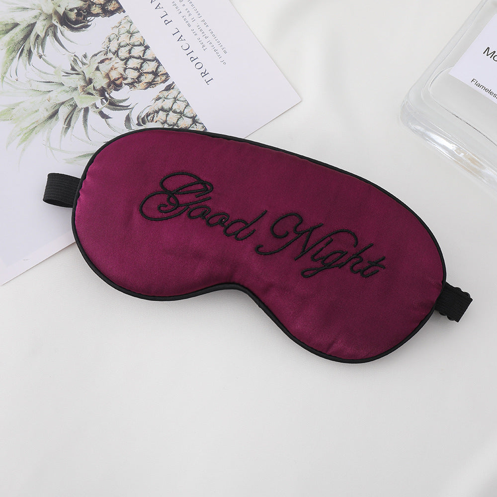 Unisex embroidered contoured sleep mask with decorative text embroidery and adjustable elastic band Stornfield