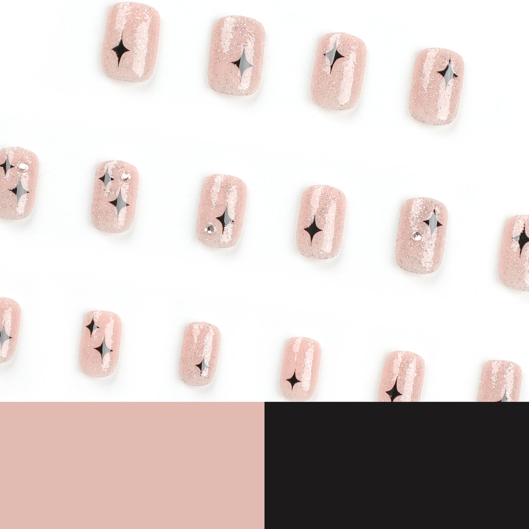 Artful Nail Extensions with Glitter and Star Pattern Stornfield
