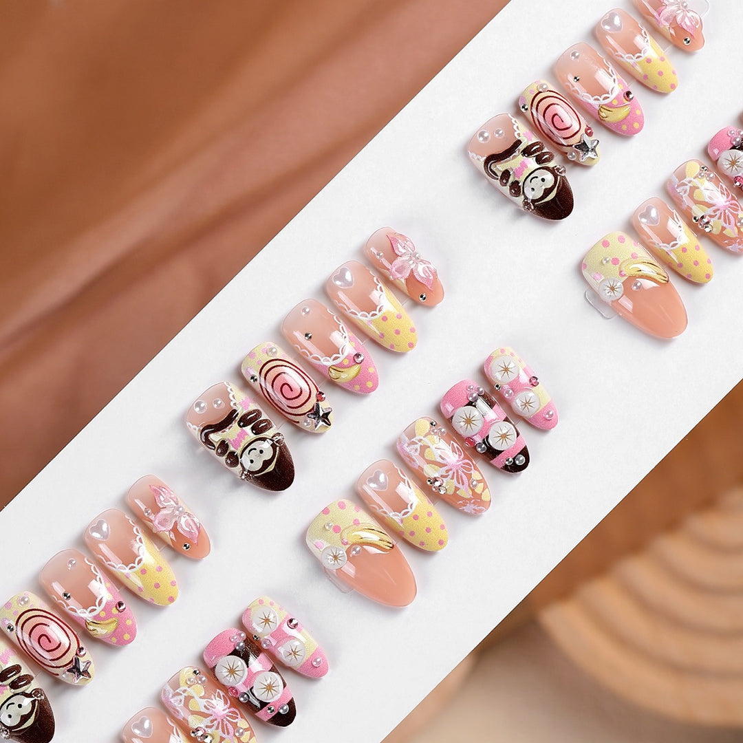 Playful artificial nails in sweet design Stornfield