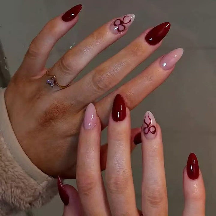 Acrylic nail set with luxurious shine and playful design accents Stornfield