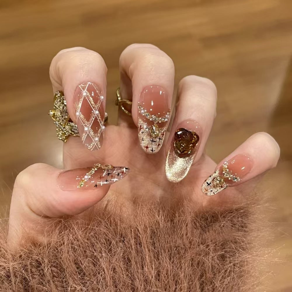 Artificial nails with glitter and heart accents Stornfield