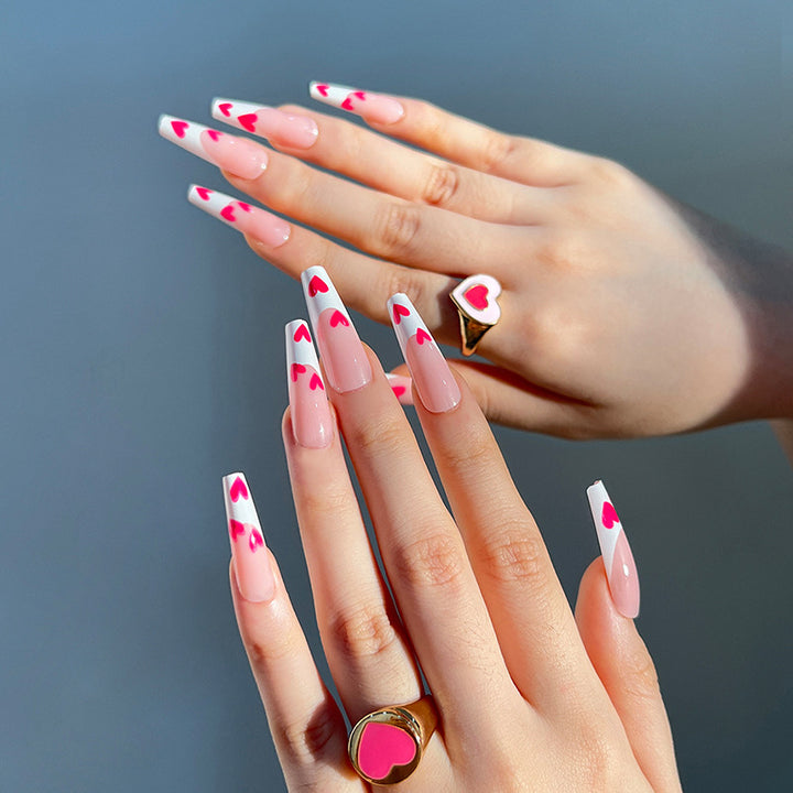 Artful Stiletto Nails with Hearts Design Stornfield