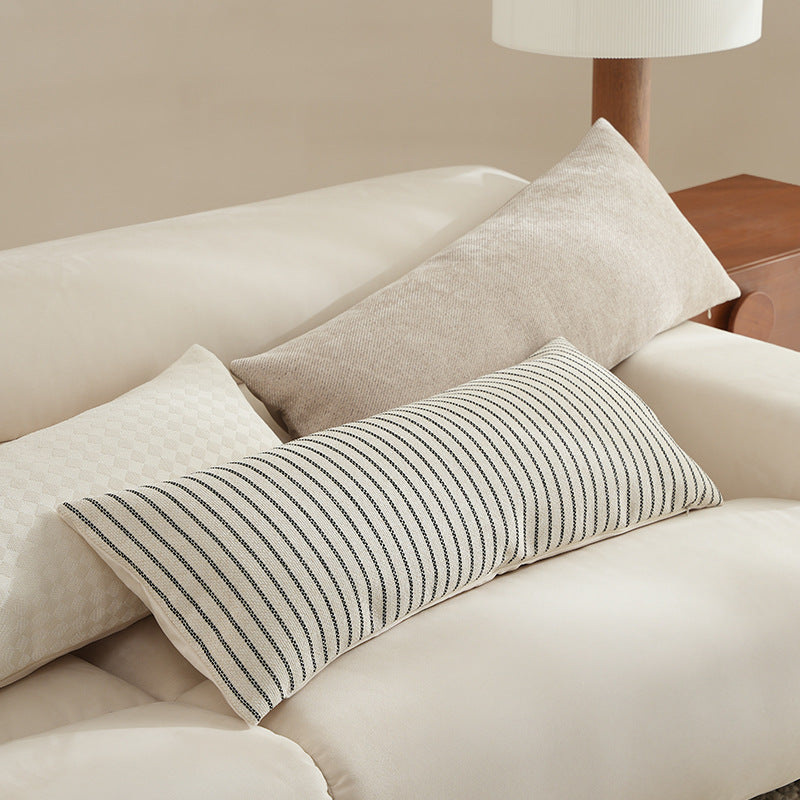 Long rectangular lumbar and neck pillow with textured woven look and concealed zipper Stornfield