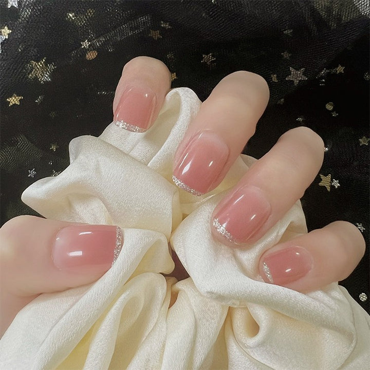 Glamorous artificial nails with moon and star motifs Stornfield